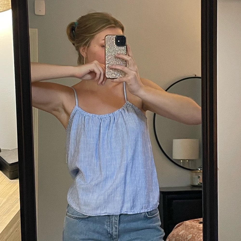 White and blue striped top from H&M in the size S.